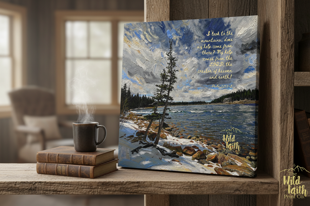 Psalm 121:1-2 canvas print leaning on a reclaimed wood shelf in a reading nook with leather books and coffee mug