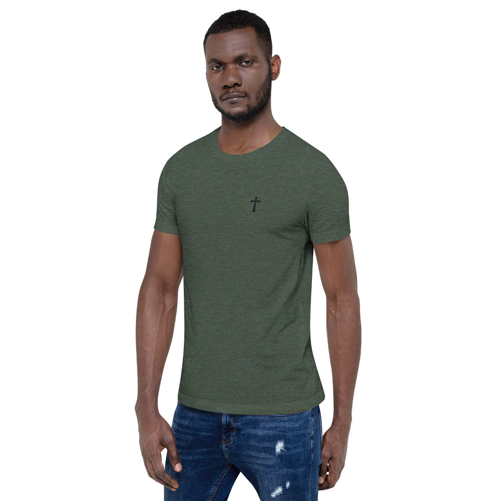 Man wearing a green t-shirt with a graphic design on a white background